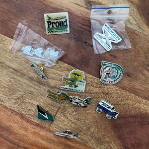 Lot of 11 vintage WESTJET AIRLINES pins